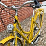 Gagnez un vélo de ville jaune de la marque Arcade